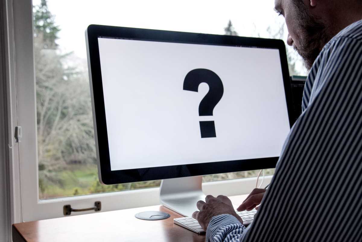 using computer with large question mark on screen 2025 01 07 22 14 13 utc